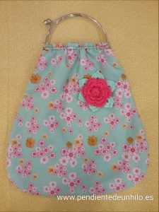 Pendientedeunhilo-bolsoconflor