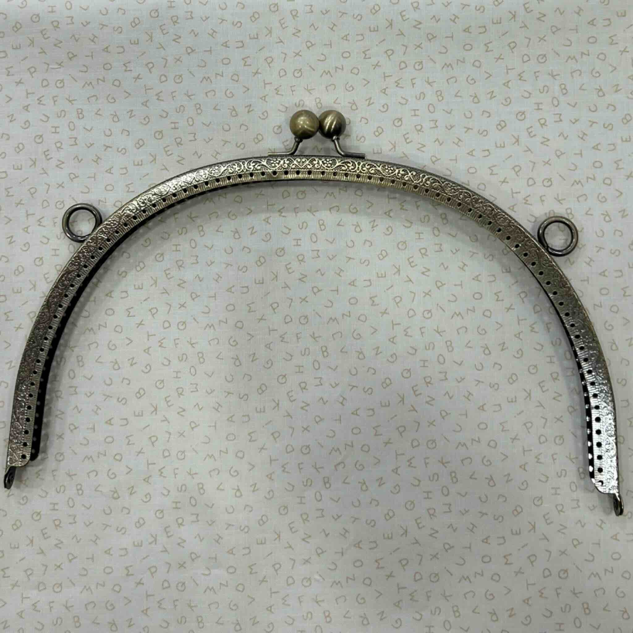 Boquilla metálica semicircular